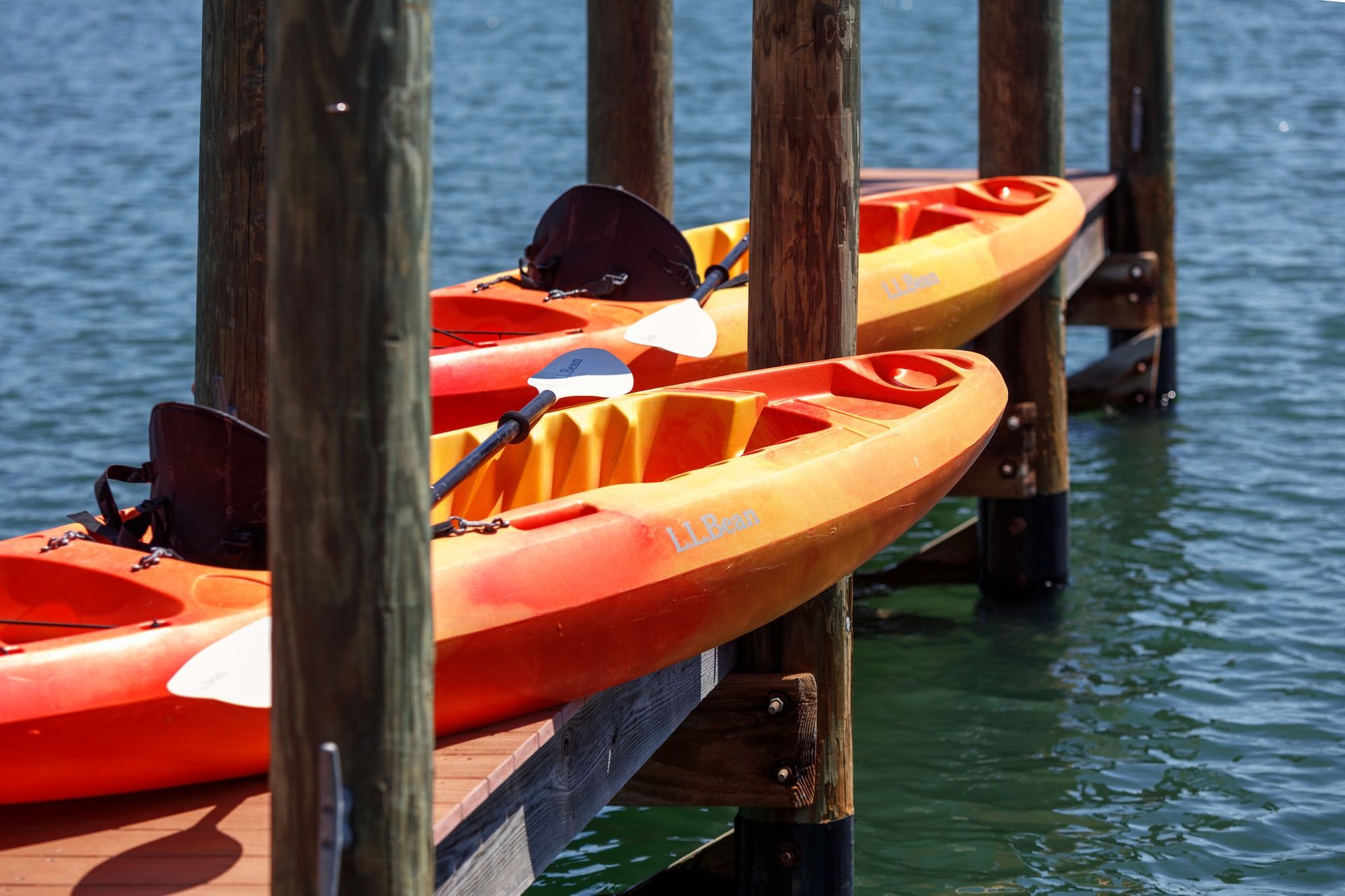 kayaks resting on pier