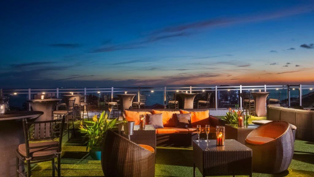 360 rooftop with beautiful sunset and comfortable lounge seating