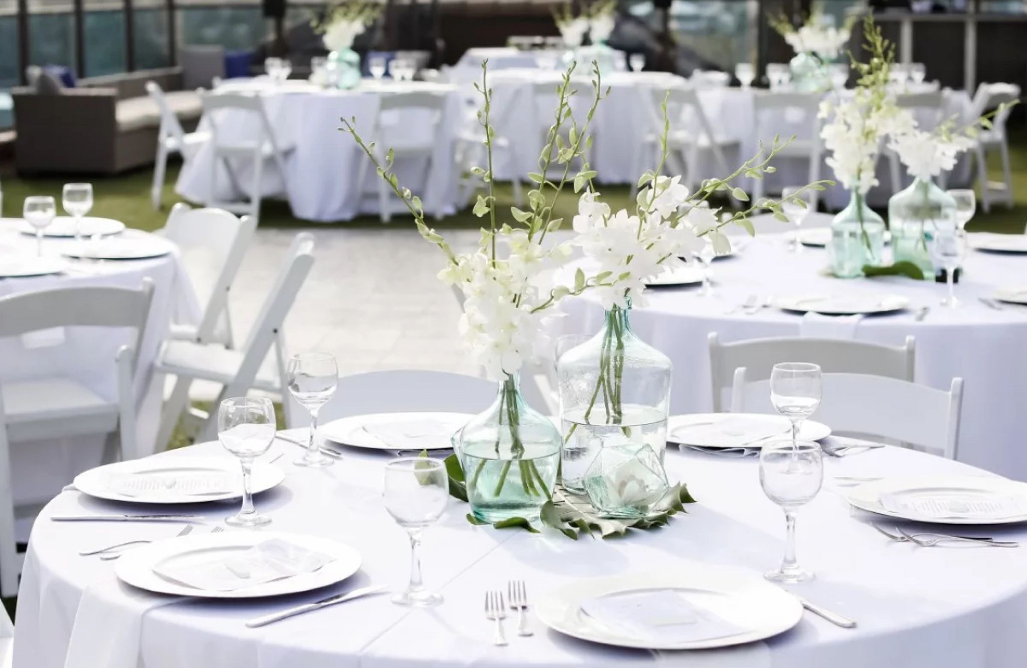 Bayside rooftop meeting space with beautiful table settings