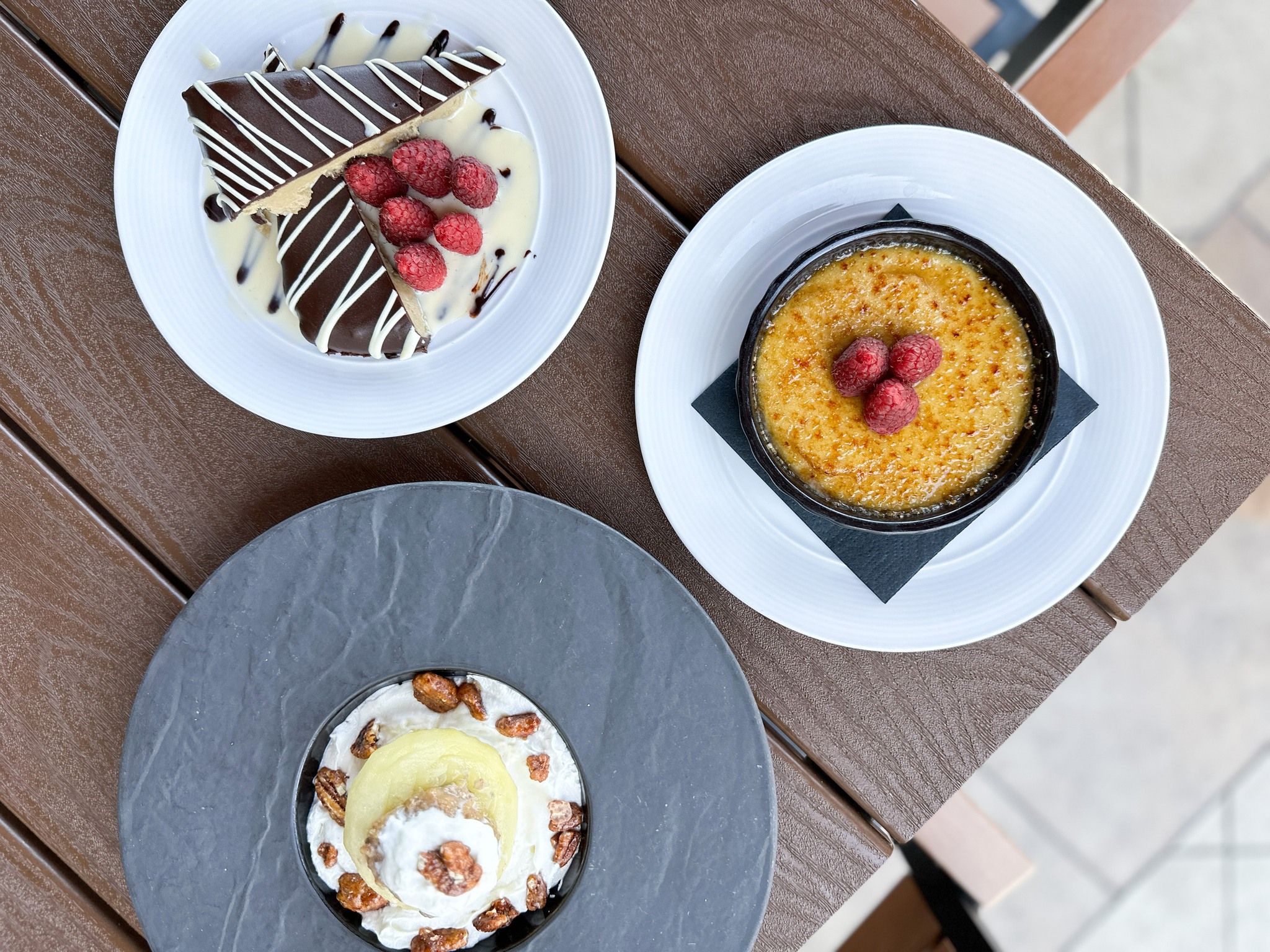 Three plates with dessert served at Castile Restaurant in St Pete Beach